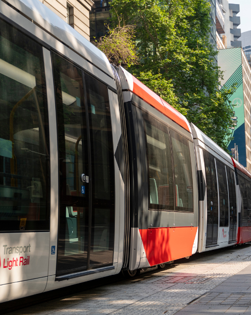 light rail and sustainability in transport through predictive analytics. tram going through city