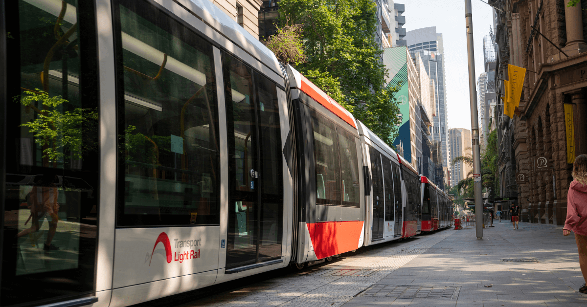 light rail and sustainability in transport through predictive analytics. tram going through city